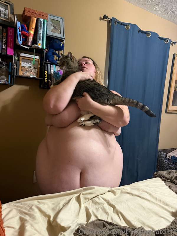 Snuck in some pics of Britt embracing one of our kitties and..