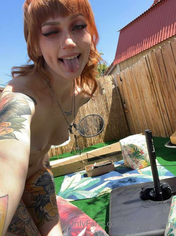 Making my backyard cute to shoot in :) I’m enjoying the sun .. 4