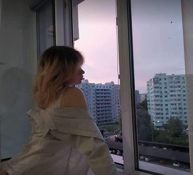 A beautiful view outside the window, or a beautiful girl in ..