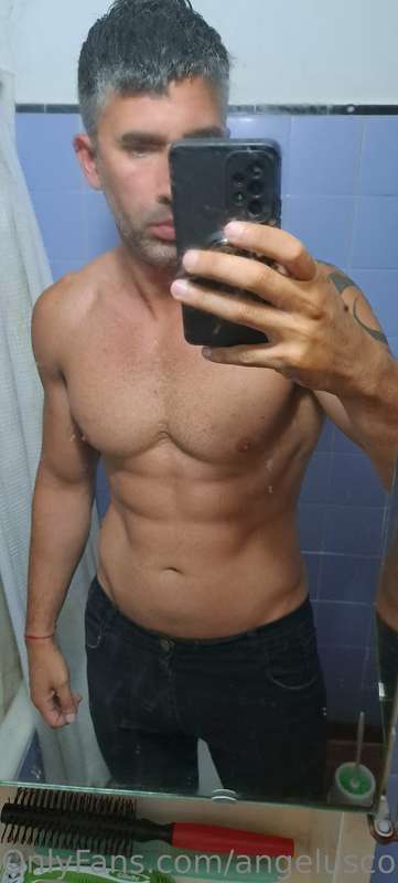 Showing off a little abs.🔥  If you want to see what's below,..