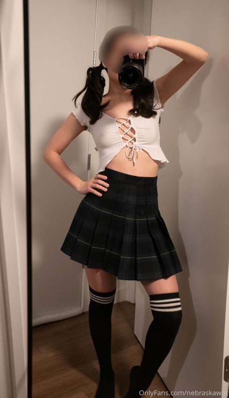 Here's a bunch of photos of me in my cute school girl outfit..