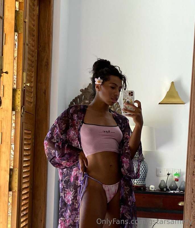Just feeling myself today 💜🌸 Loving this floral robe and bik.. 3