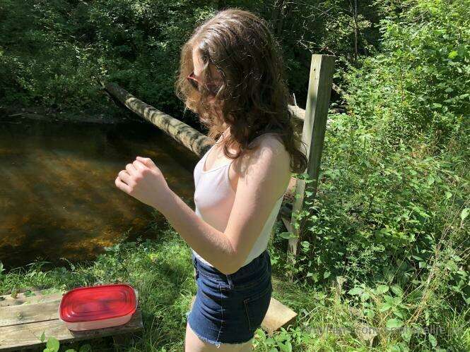 Cooling down with a creek walk on one of the last hot days b..