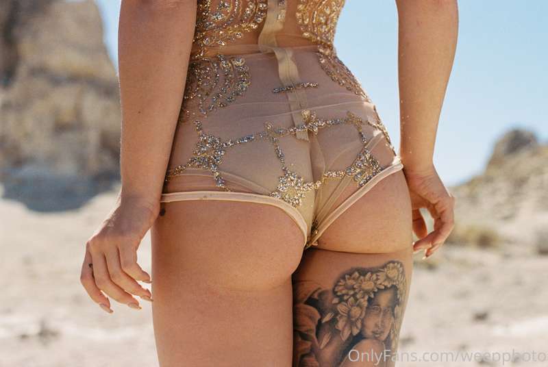 See the full version plus some topless photos! Can you tell ..