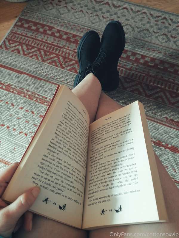 I'm wearing in my new "fuck me" boots with some reading - Tr..