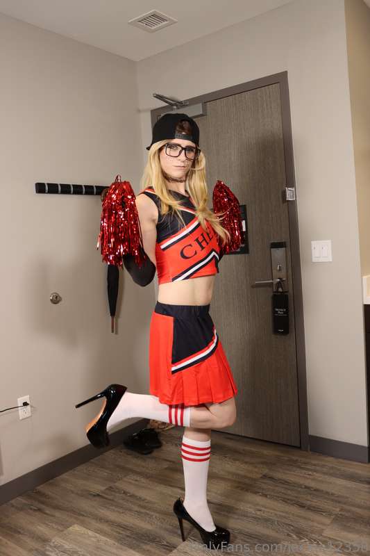 Here are 4 pictures of me in my new cheerleader outfit 🥰 4