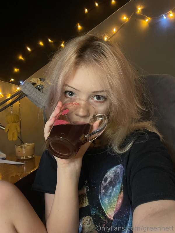 Sipping tea like it holds all the secrets of the universe…or..