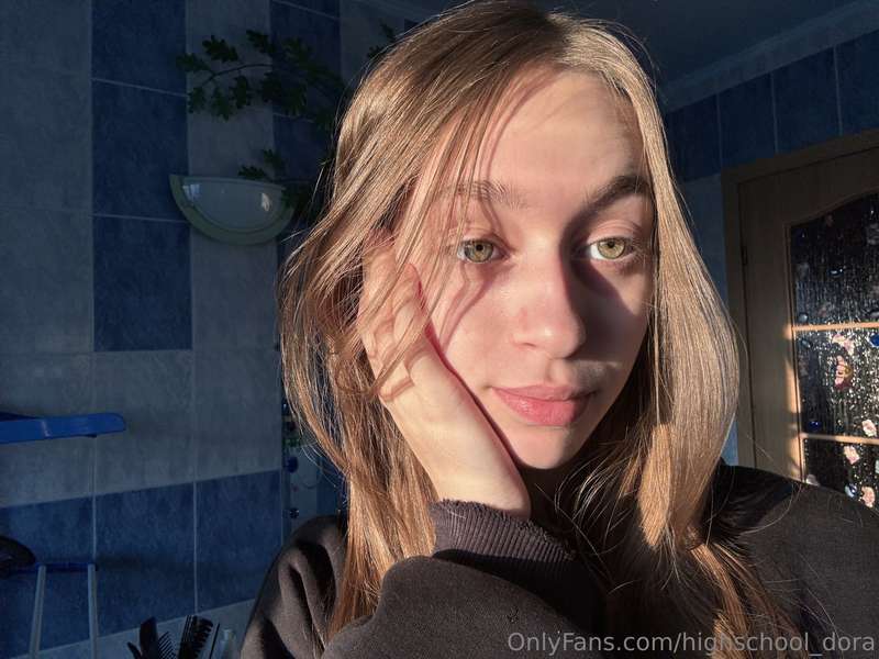Taking selfies in the sunlight, enjoying the warmth on my sk..