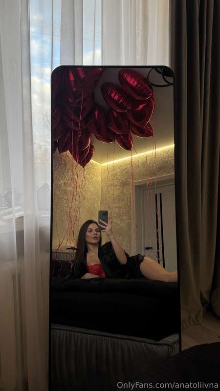 Dressed in red lace lingerie,lying on the bed and imagining ..