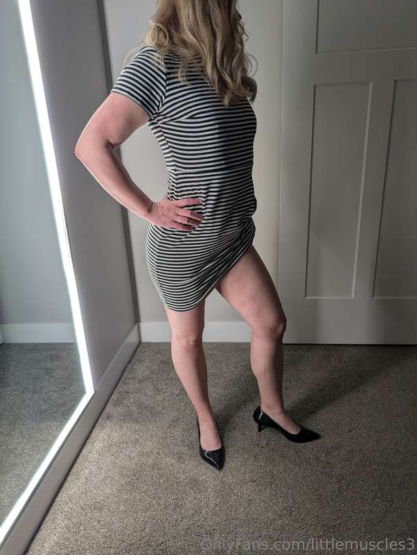 My dress feels cool against my skin, a stark contrast to the..