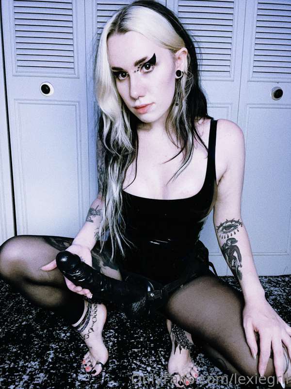 Something about latex and a big strap on