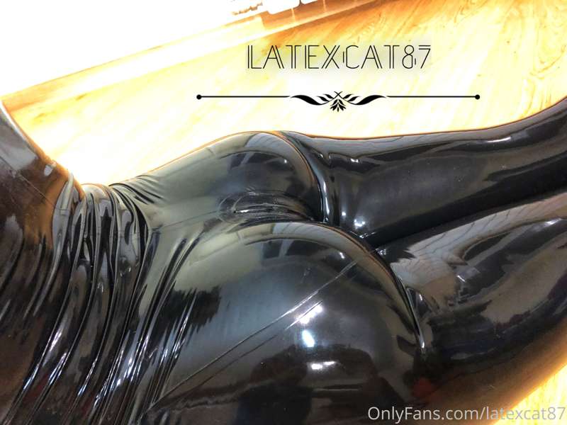 Black latex on my lithe body. 1