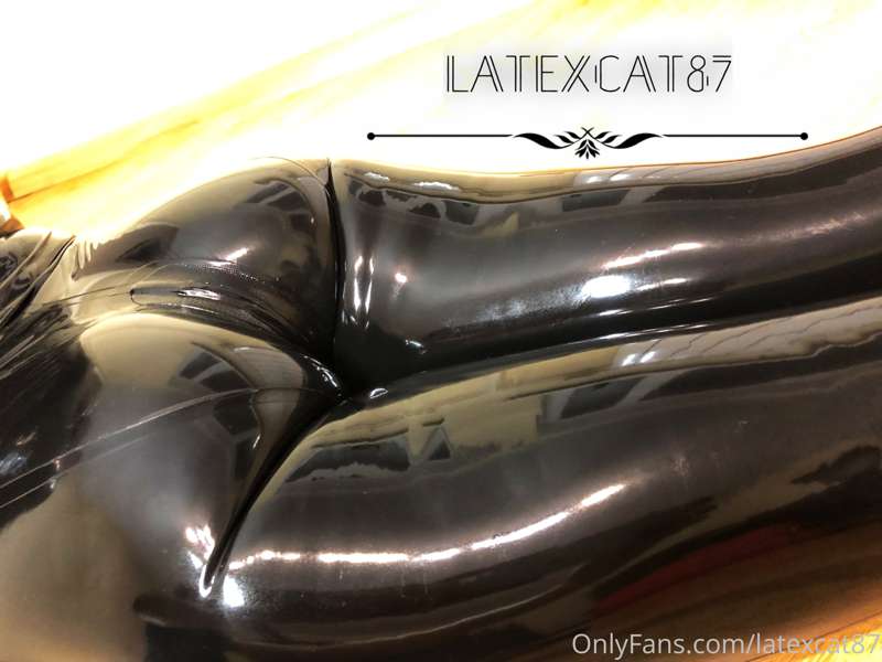 Black latex on my lithe body. 4