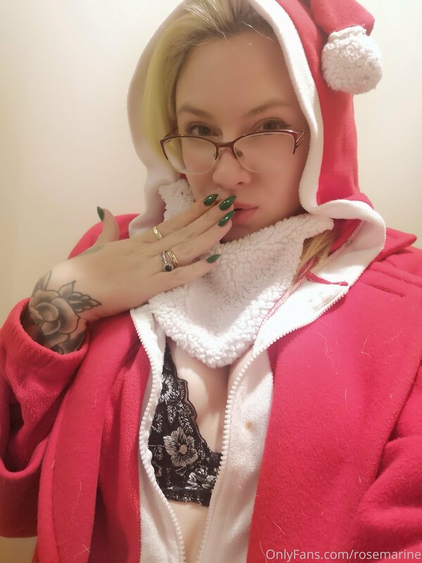 Sexy Santa checking her list twice, are you sure you've been..