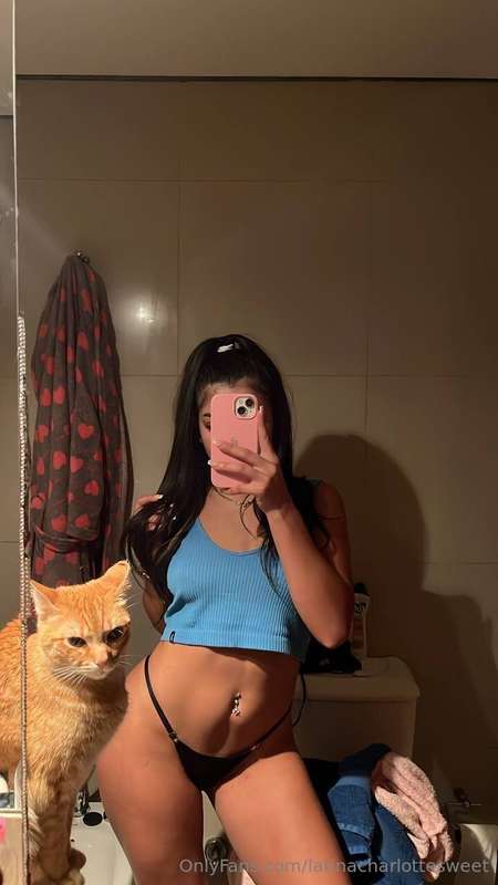Taking a pre-bed time selfie but my cat's secretly judging m..