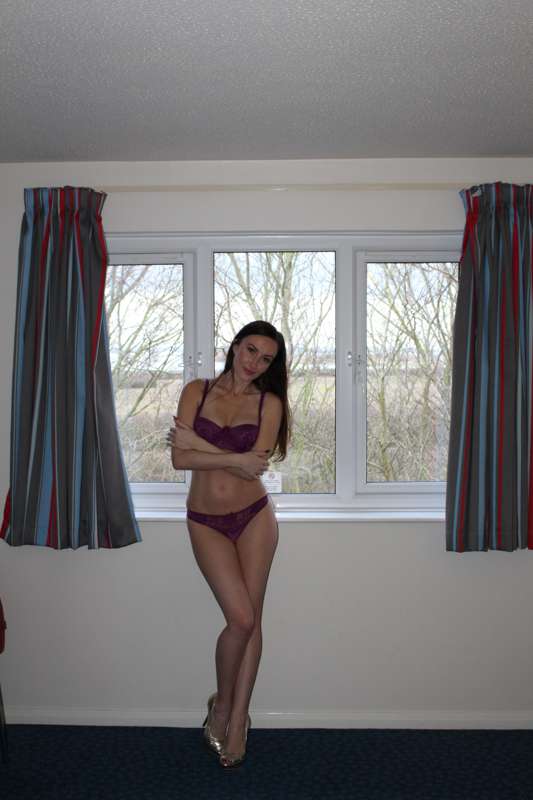 Stripping off by the window! 4