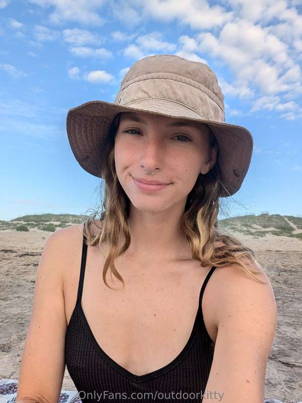 Pretty girl on a really pretty beach... What more could you ..