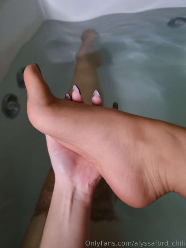 in the hot tub in a nylon dress and nylon stockings  6
