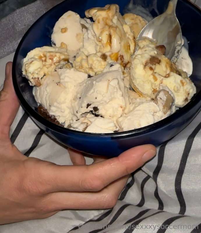 In bed, pleasuring myself tonight. 😉  IYKYK 🍨 📺