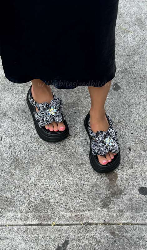 ***I got a lot of new chunky shoes that make me look like a .. 1
