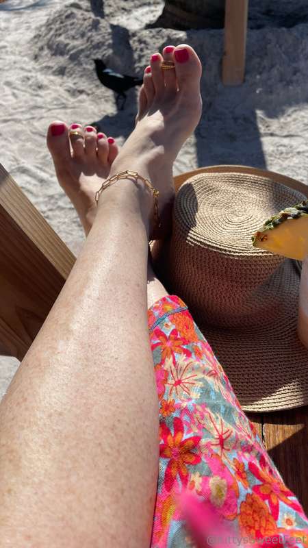 Soaking up the sun at St. Pete Beach, Florida—piña colada in.. 3