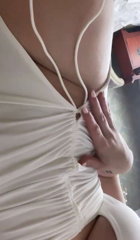 My favorite thing about this dress is the high slit so you c..