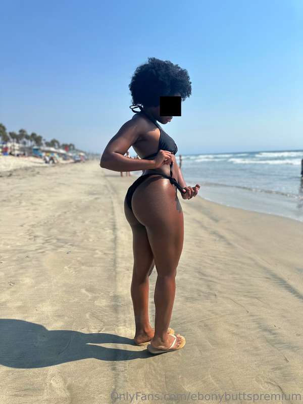 At the beach showing off cheeks for all the white men that I.. 1