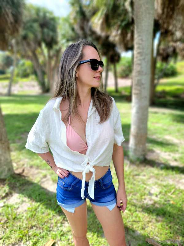 Just your average girl next door hanging out at a beach park