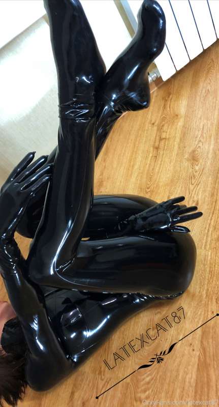 Black latex on my lithe body. 13
