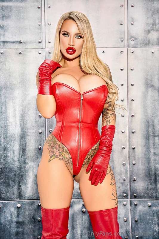 Completely in red leather - the whole photoset. Enjoy it!