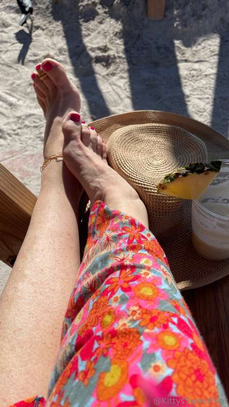 Soaking up the sun at St. Pete Beach, Florida—piña colada in.. 2