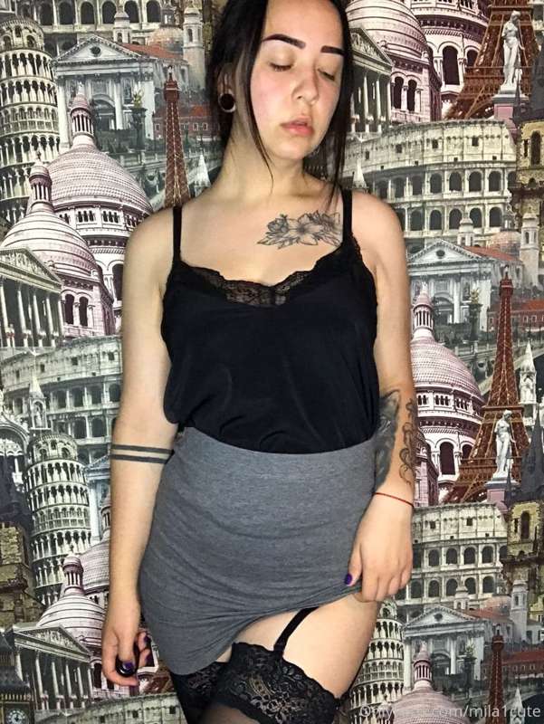 oops. my stocking strap unbuttoned. if I lift my skirt even ..