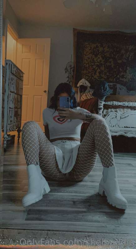 this picture just reminded me that I have white fishnets omg.. 1